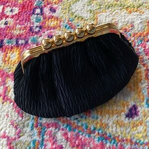 Carla Marchi convertible clutch.
